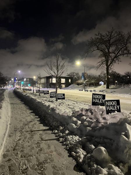 Campaign signs along a snowy road